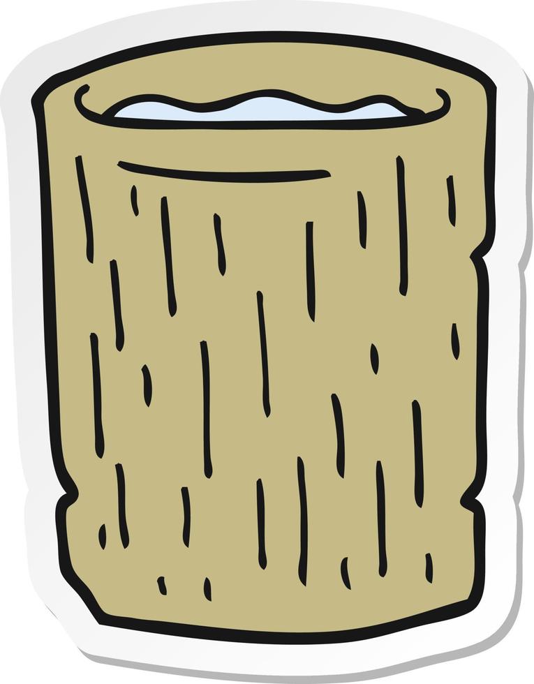sticker of a cartoon wooden cup with water vector