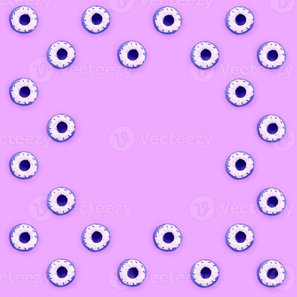 Many small plastic donuts lies on a pastel colorful background. Flat lay minimal pattern. Top view photo