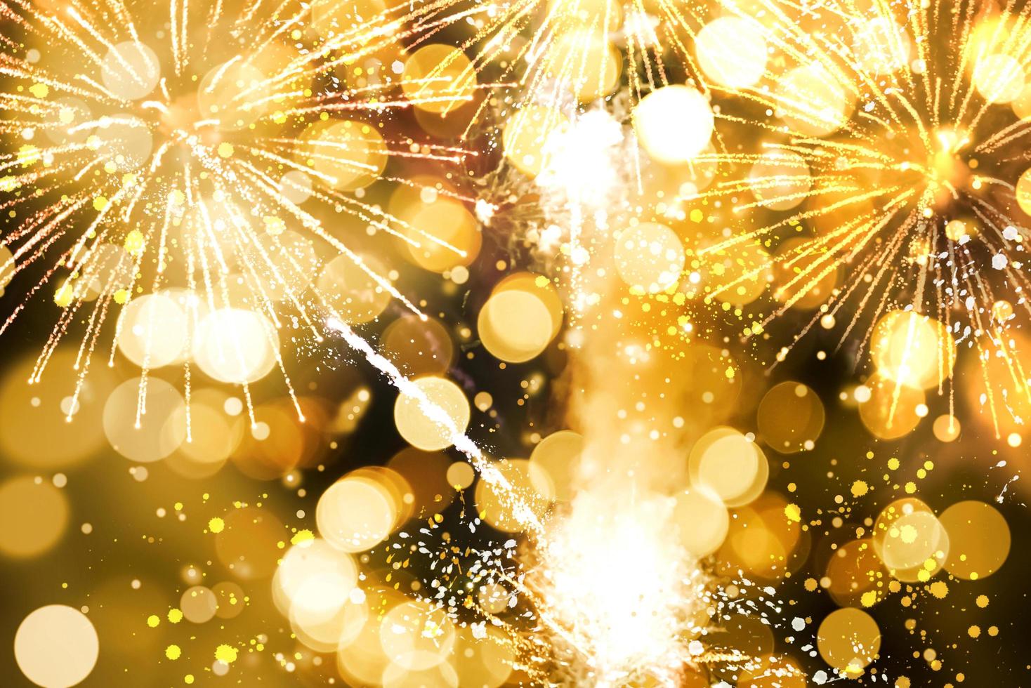 Abstract background. Gold-colored blur. Fireworks circle blur photo