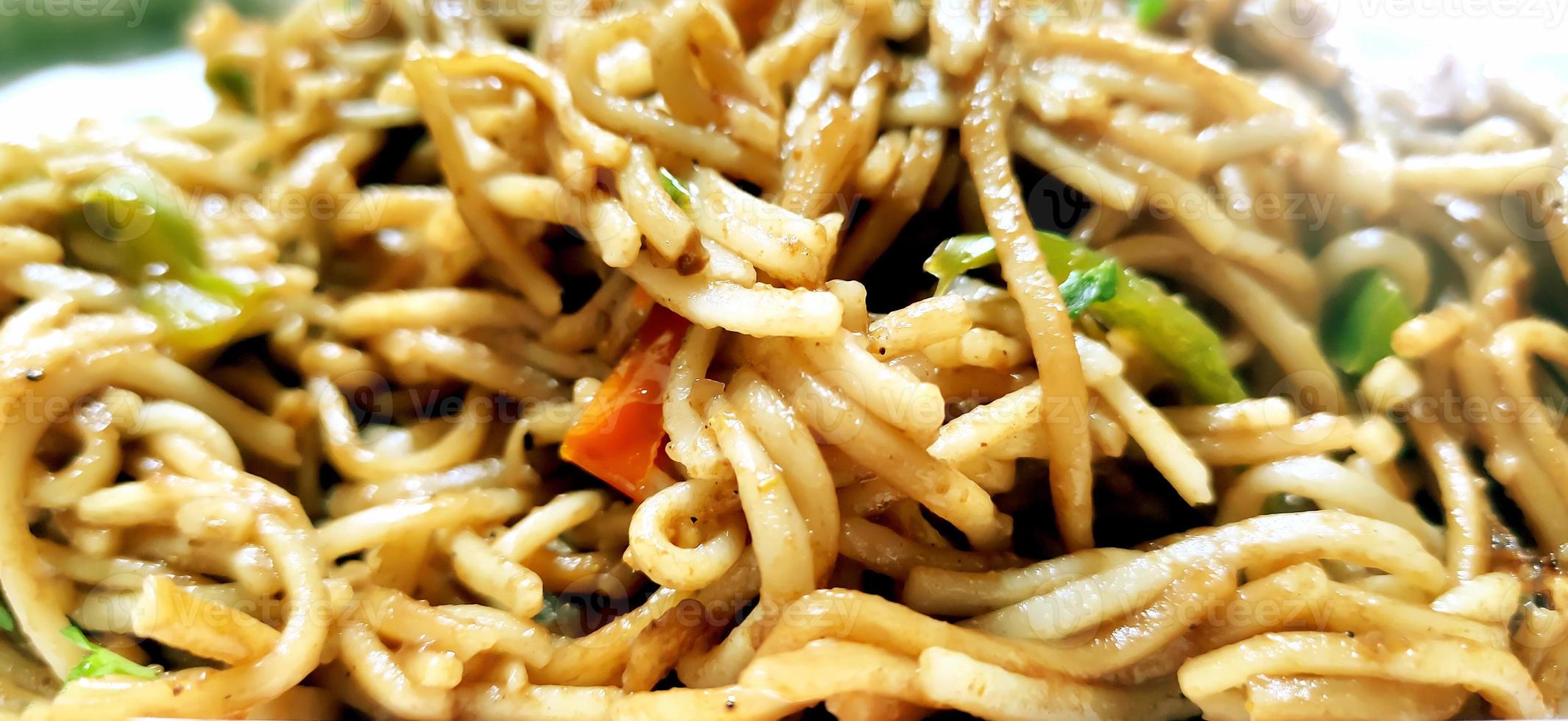 Schezwan Noodles or vegetable Hakka a popular Indo-Chinese recipe photo