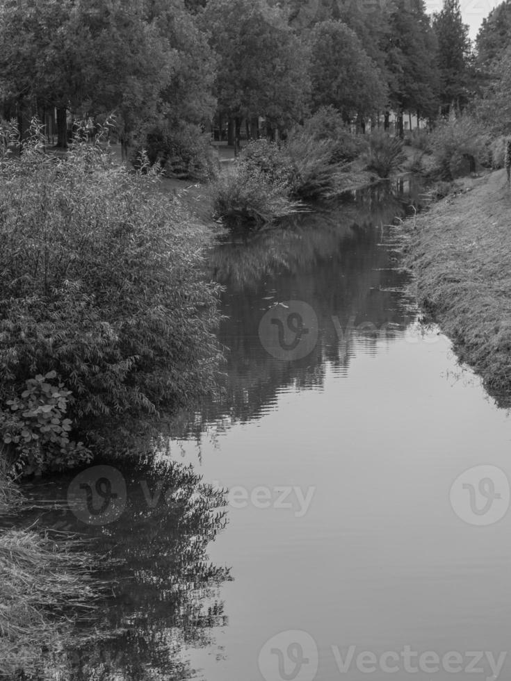 The city of Coesfeld at the river berkel in germany photo