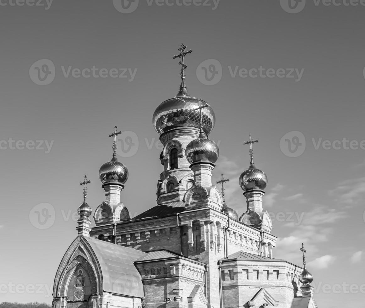 Christian church cross in high steeple tower for prayer photo