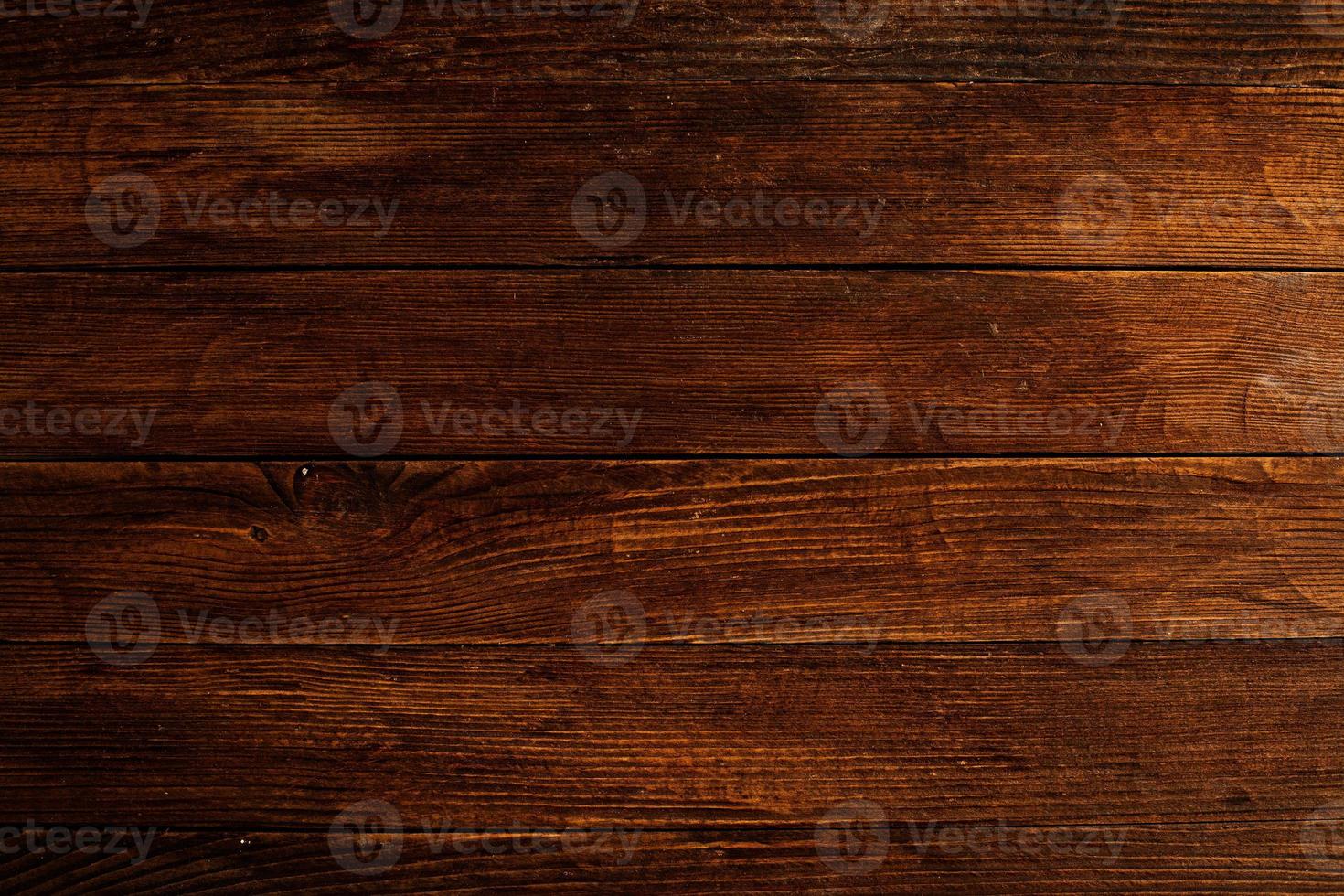 Vintage colored wood background texture with knots and nail holes. Old painted wood wall. Wooden dark horizontal boards. Front view with copy space. photo