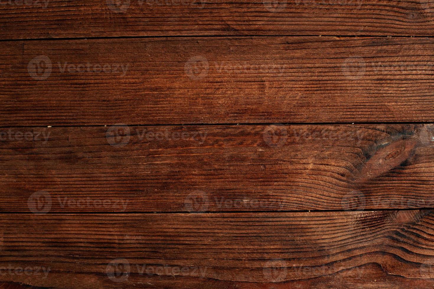 Vintage colored wood background texture with knots and nail holes. Old painted wood wall. Wooden dark horizontal boards. Front view with copy space. photo