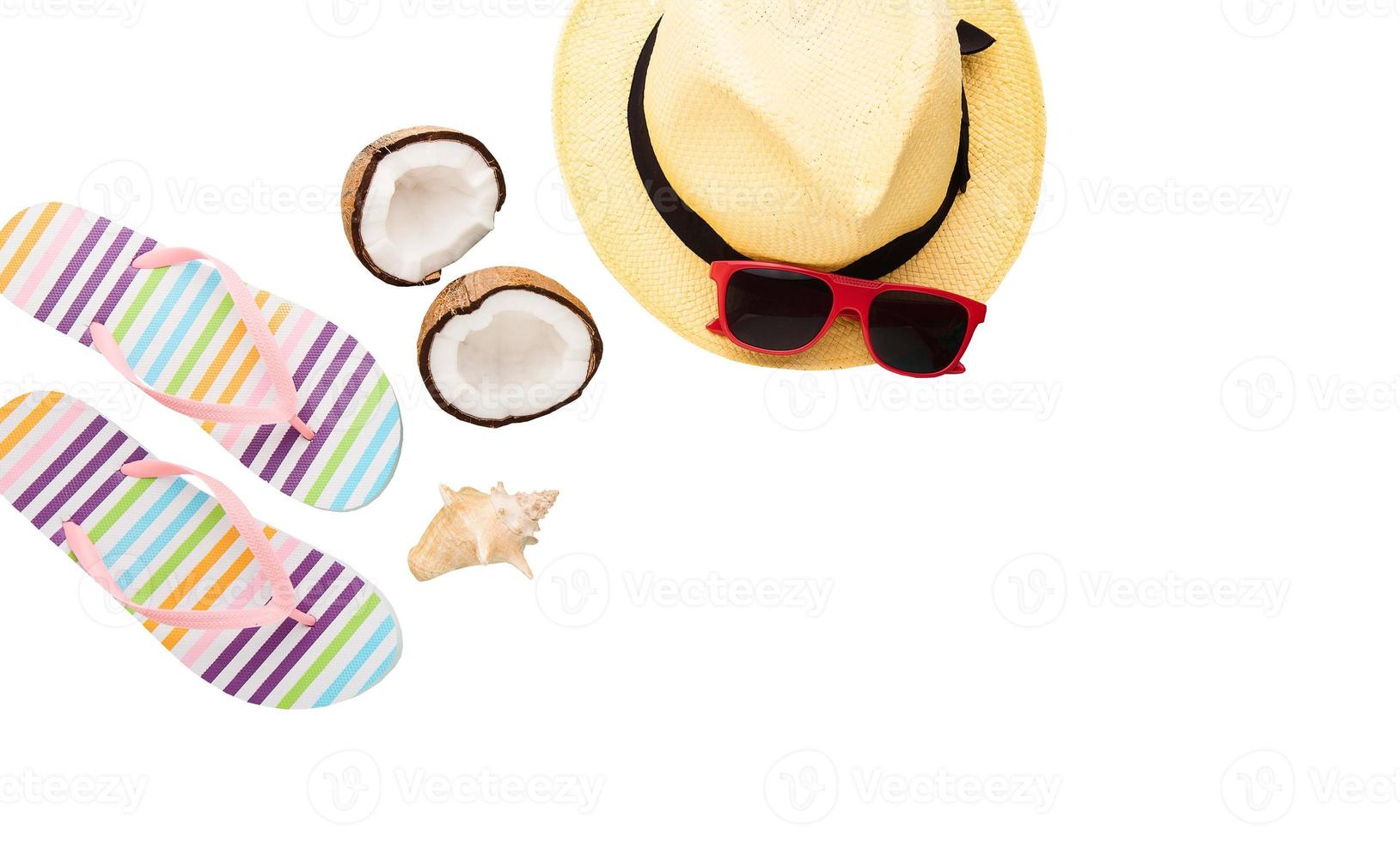 Summer accessories. Shoes, shell, hat, coconut, sunglasses. Summertime background isolated on white. Flip flops and food top view. Striped slippers photo