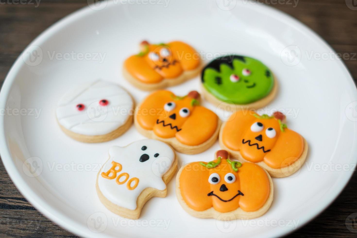 Happy Halloween day with funny Cookies set on wooden table background. Trick or Threat, Hello October, fall autumn, Festive, party and holiday concept photo