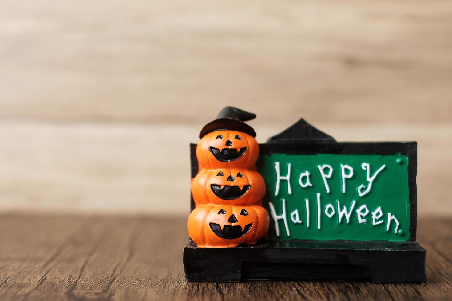 Orange pumpkin on table with copy space for banner background. Happy Halloween day, Hello October, fall autumn season, Festive, party and holiday concept photo