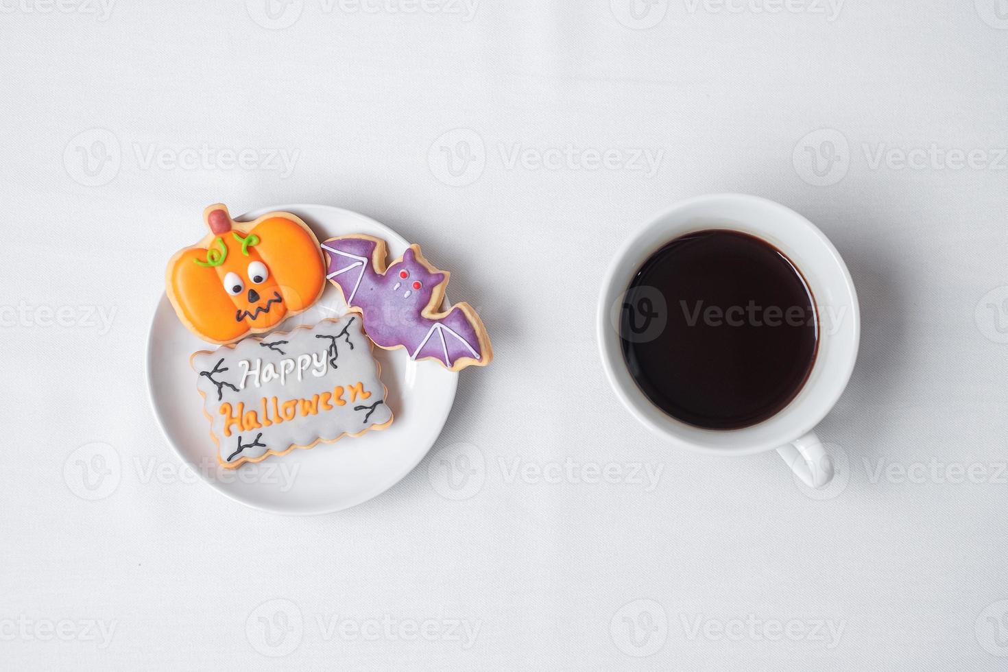 hot coffee cup with funny Halloween Cookies. Happy Halloween day, Trick or Threat, Hello October, fall autumn, Traditional, party and holiday concept photo