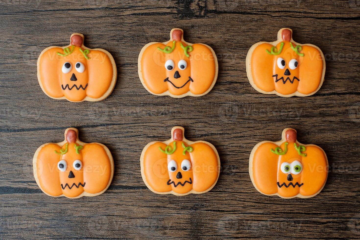 Happy Halloween day with funny Cookies set on wooden table background. Trick or Threat, Hello October, fall autumn, Festive, party and holiday concept photo