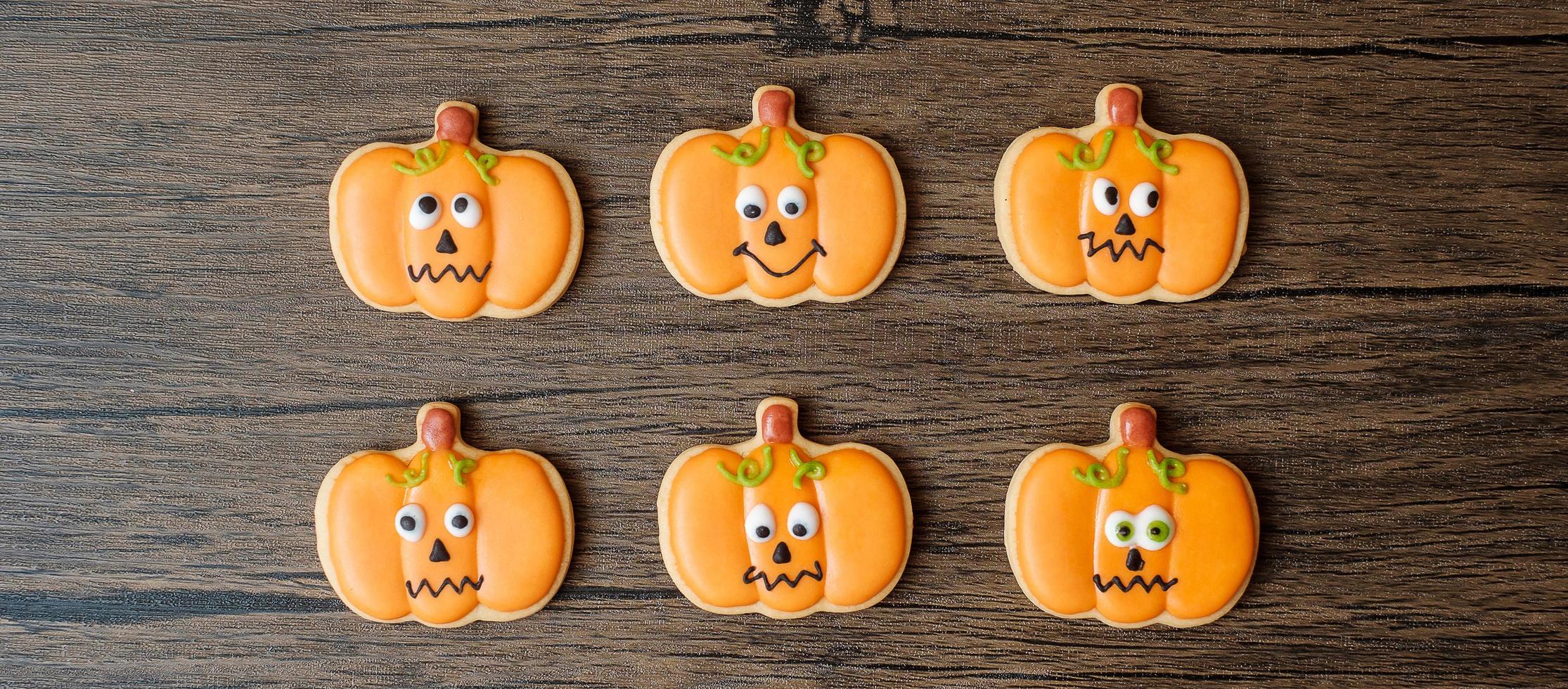 Happy Halloween day with funny Cookies set on wooden table background. Trick or Threat, Hello October, fall autumn, Festive, party and holiday concept photo