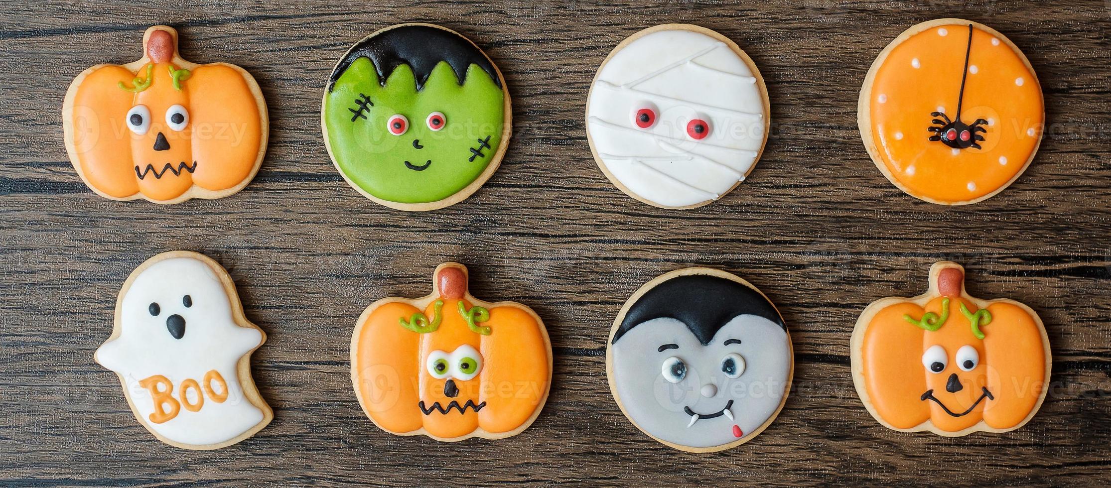 Happy Halloween day with funny Cookies set on wooden table background. Trick or Threat, Hello October, fall autumn, Festive, party and holiday concept photo
