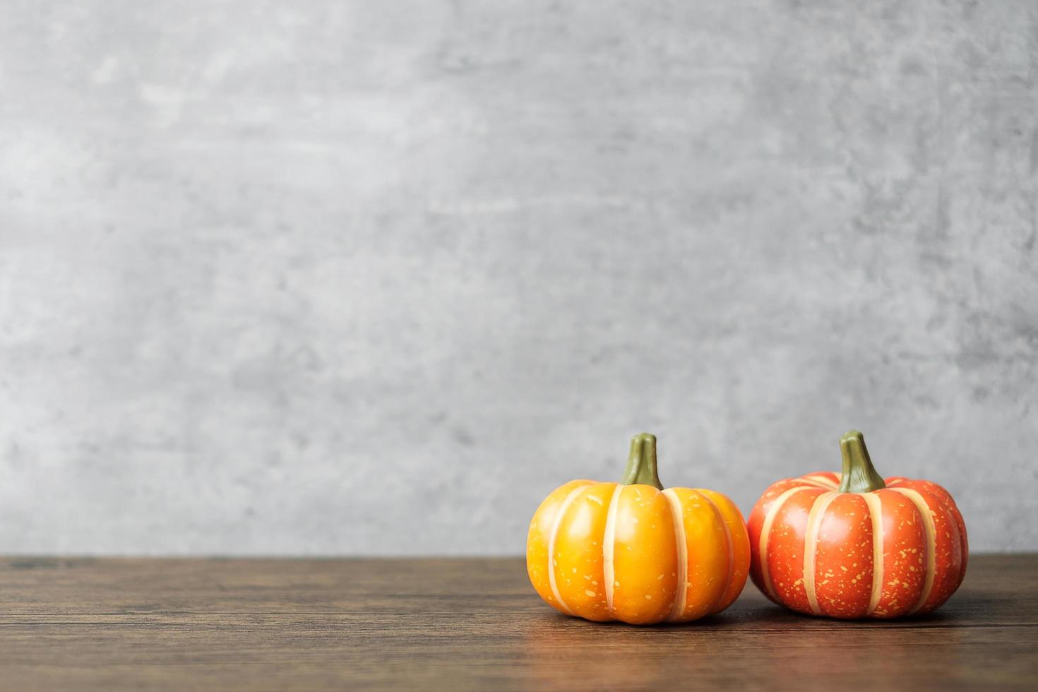 Orange pumpkin on table with copy space for banner background. Happy Halloween day, Hello October, fall autumn season, Festive, party and holiday concept photo