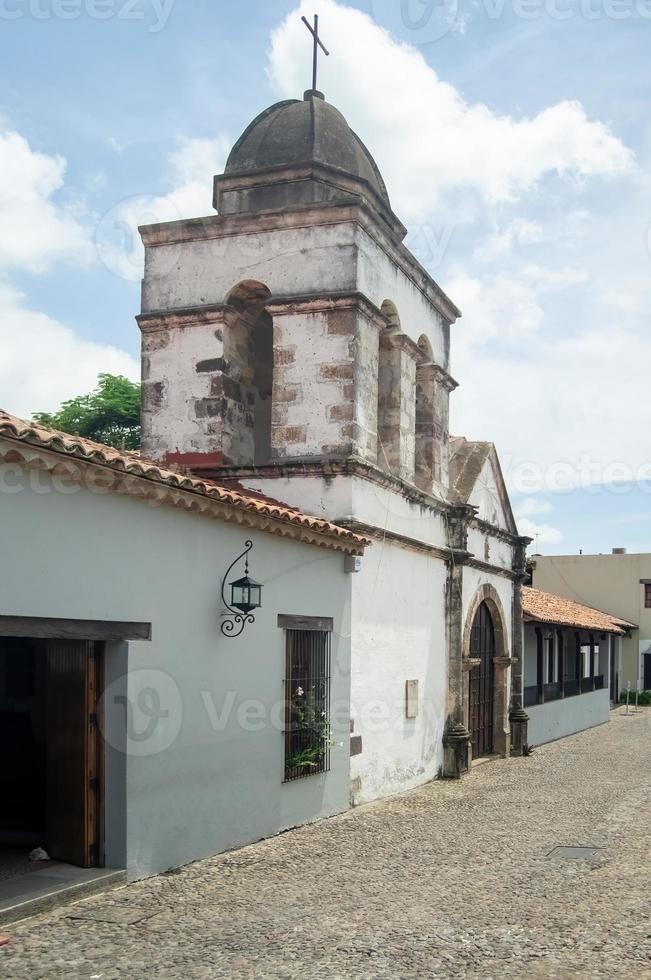 chapel Old building, village church, colonial architecture walls, aged wooden door photo