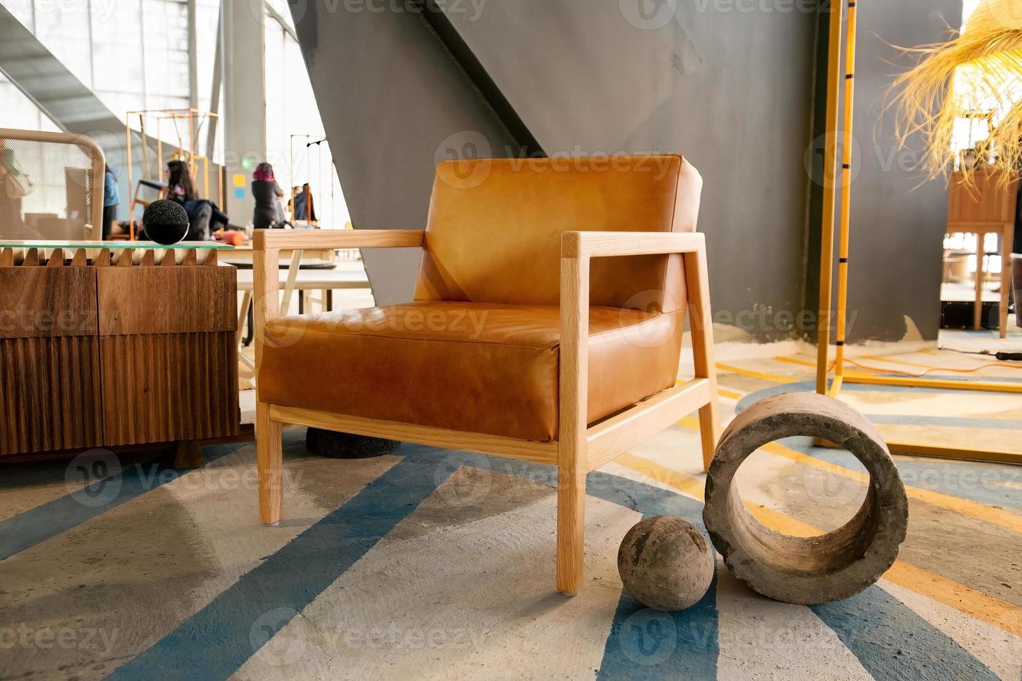 armchair, chair, individual sofa, solid natural wood structure, seat and back in natural leather photo