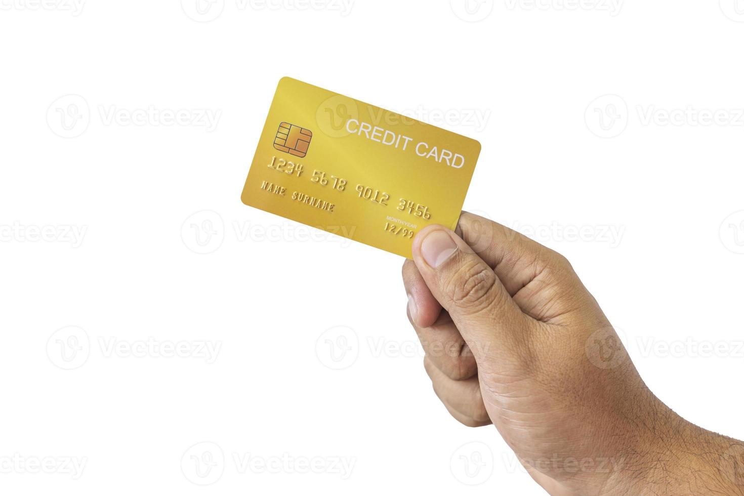 Close-up hand of Asian man holding yellow gold credit card in his hand. isolated on white background. Concept of finance, trading, communication, social, technology, business photo