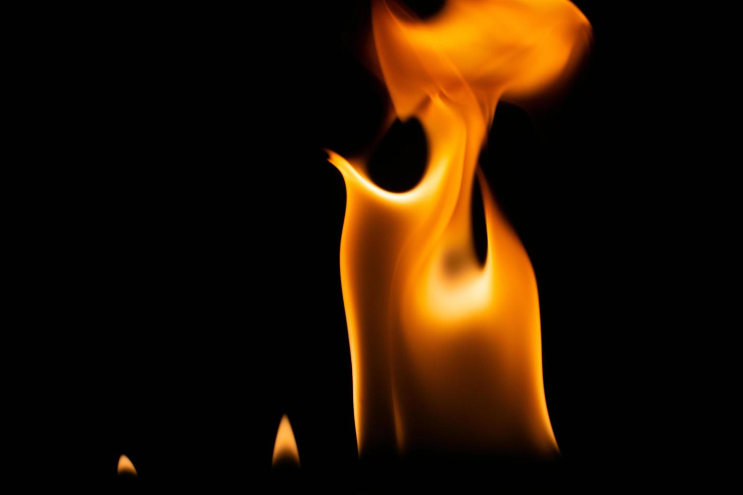 burning power of the flame, Flames, and burning sparks close-up, fire patterns, the glow of fire in the dark photo