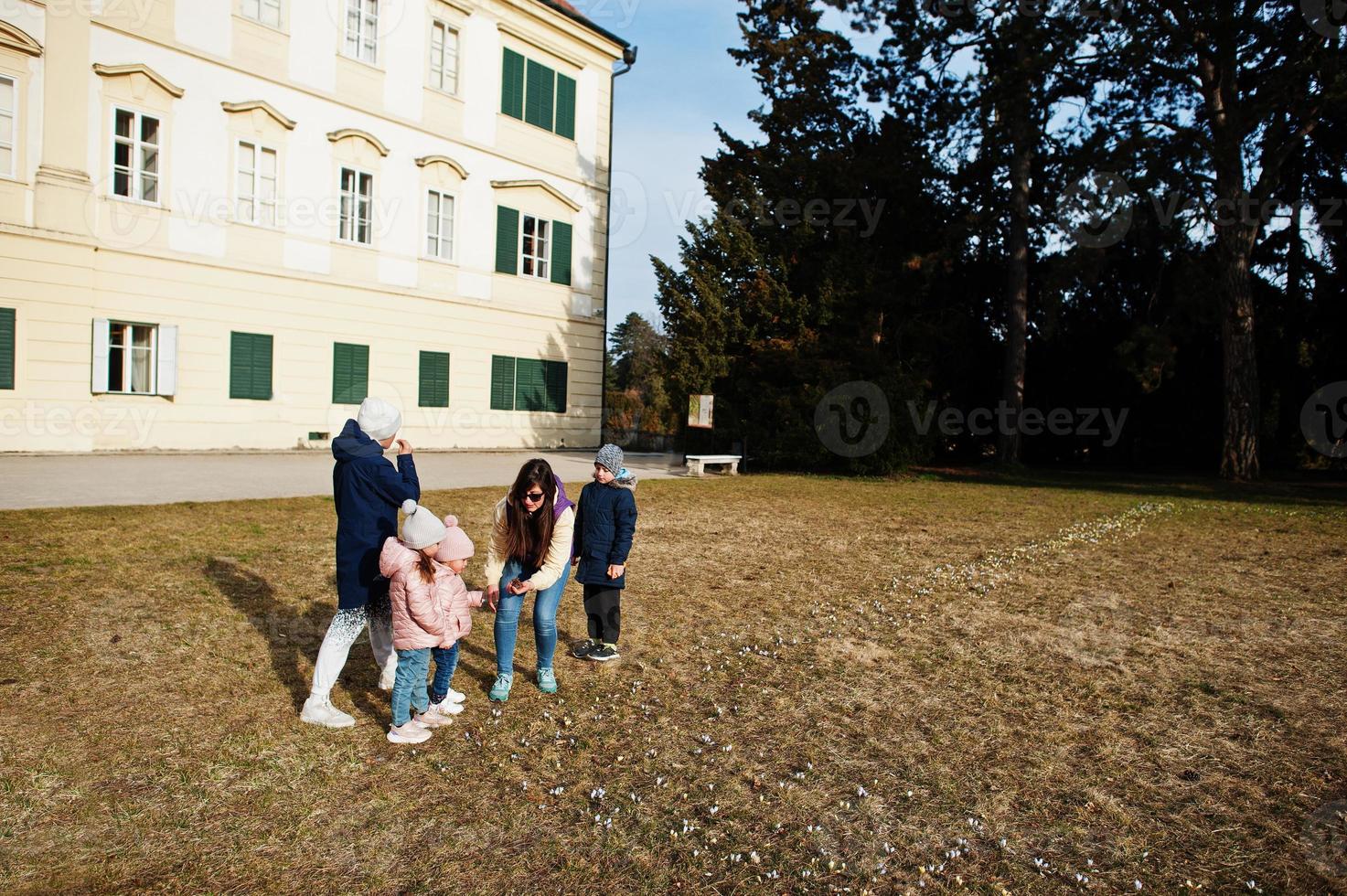 Mother with four kids at Valtice park, Czech Republic. photo