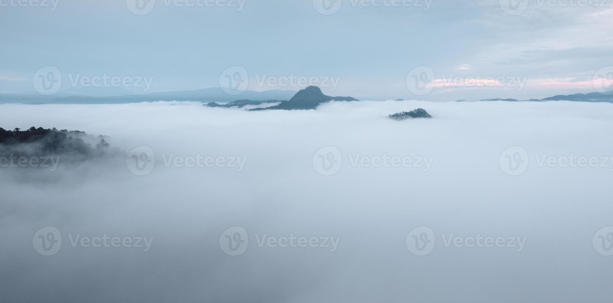 fog and mountains in the morning photo