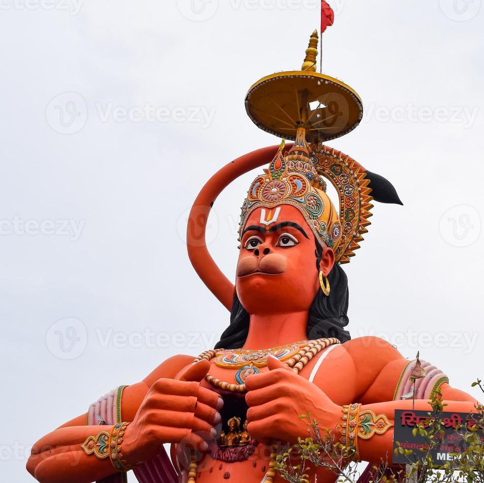 Big statue of Lord Hanuman near the delhi metro bridge situated near Karol Bagh, Delhi, India, Lord Hanuman big statue touching sky photo