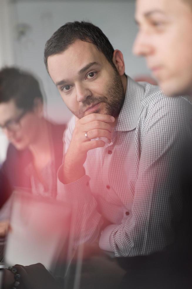 Business Team At A Meeting at modern office building photo