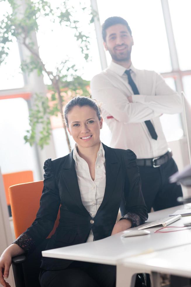 portrait of business couple at office photo