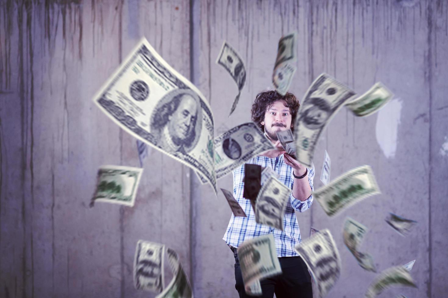 businessman making the rain of money photo