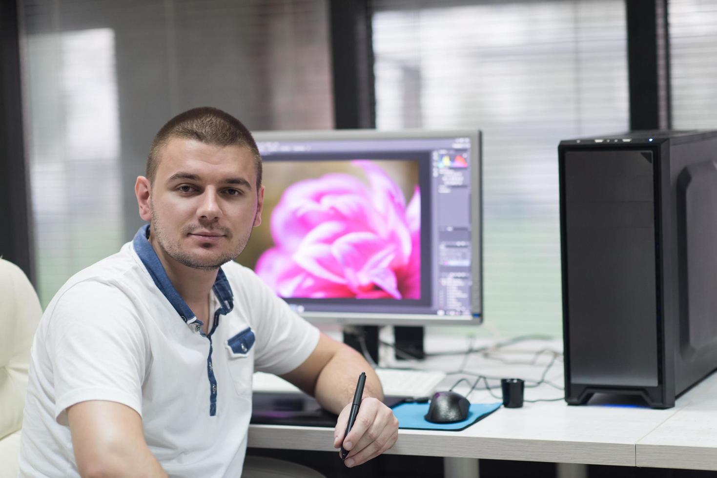 photo editor at his desk