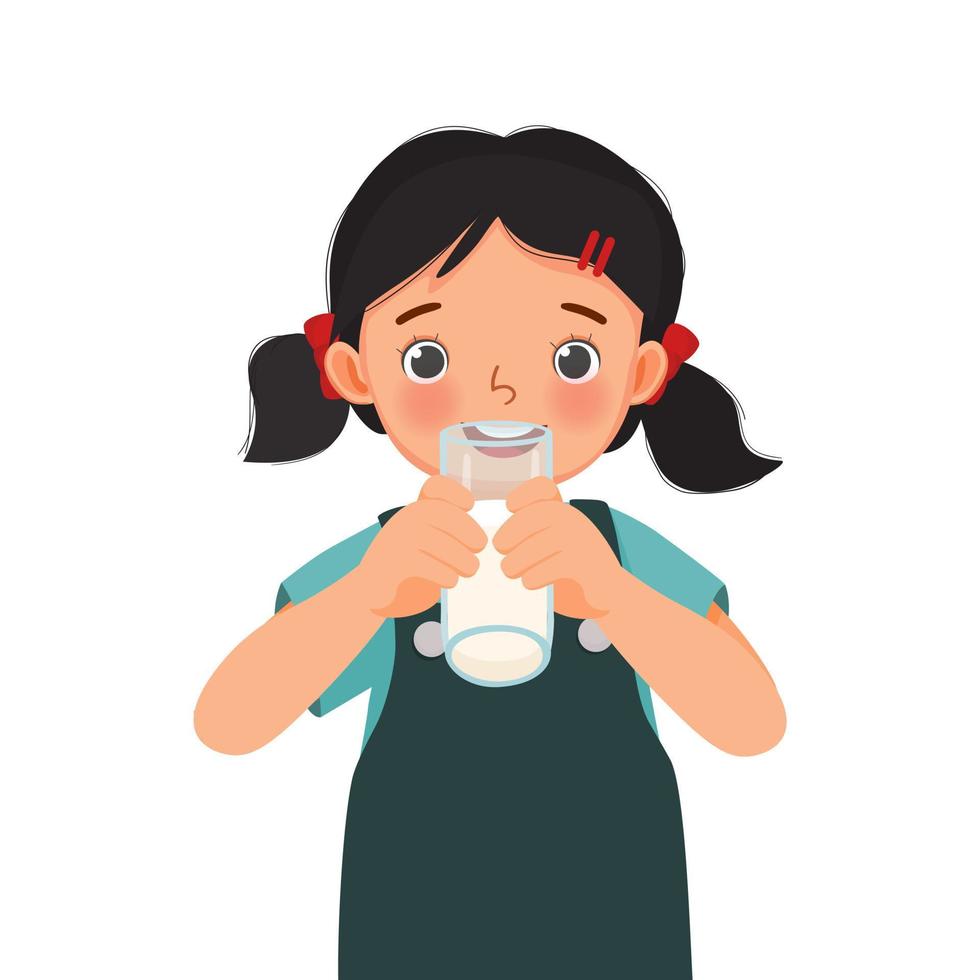 linda niña bebiendo un vaso de leche vector