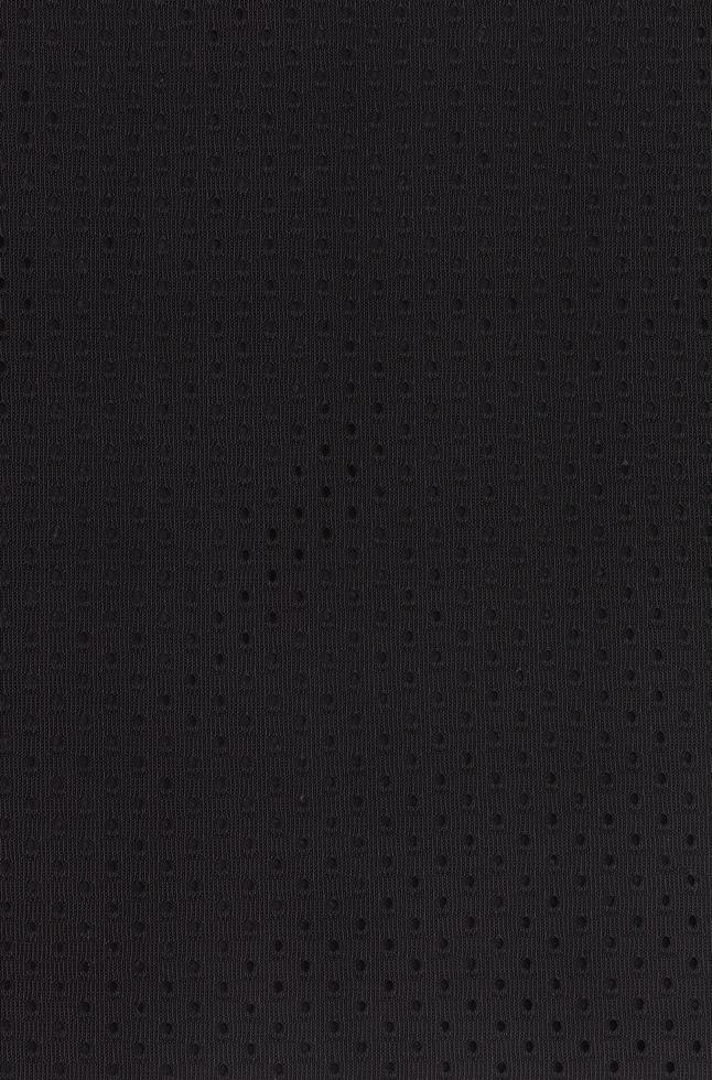 Black mesh sport wear fabric textile background pattern photo