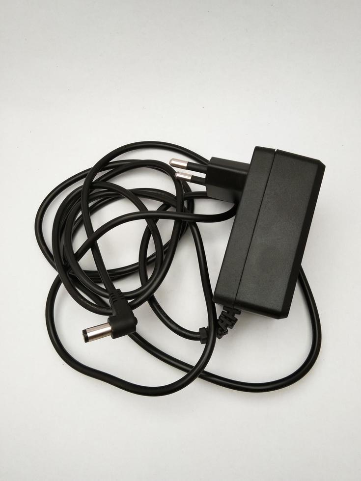 black mini adapter with white background photo