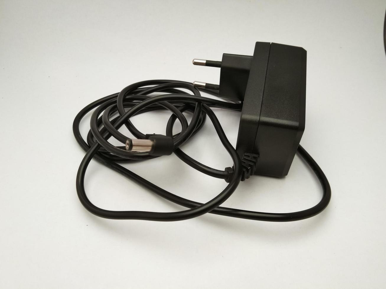 black mini adapter with white background photo