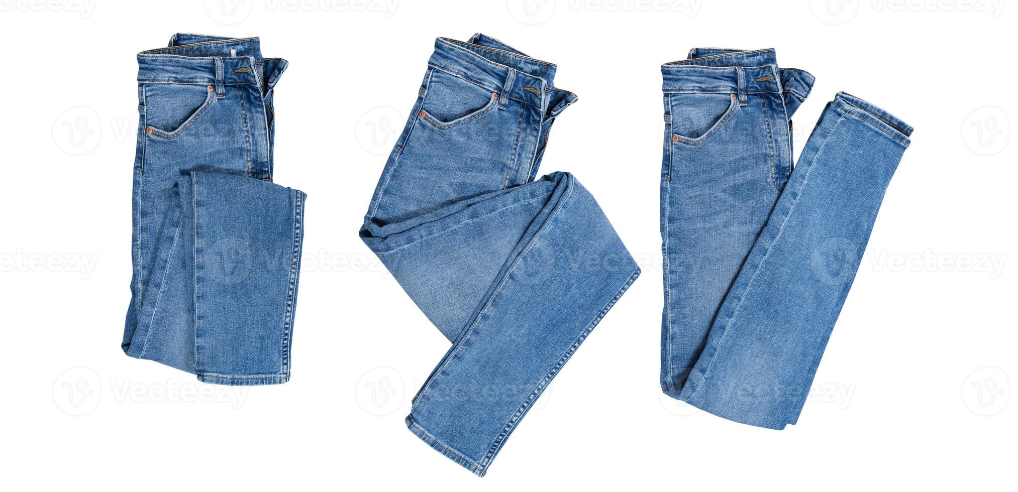 Denim set isolated, folded blue jeans pants collage over white photo
