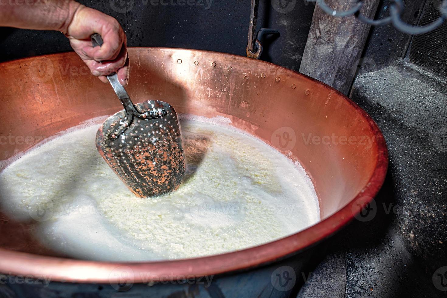 Perforated copper plucker mixes genuine mountain pasture ricotta photo