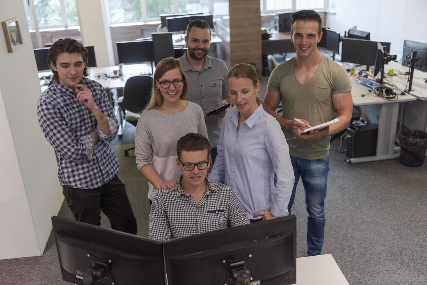 group of young startup business people standing as team photo