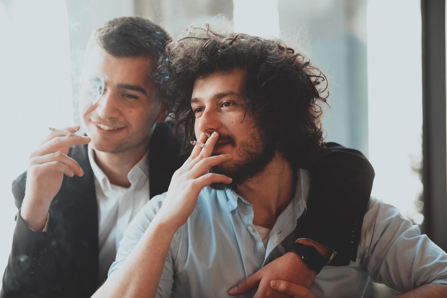 Portrait of multiethnic diverse gay LGBT romantic male couple embracing and showing their love photo