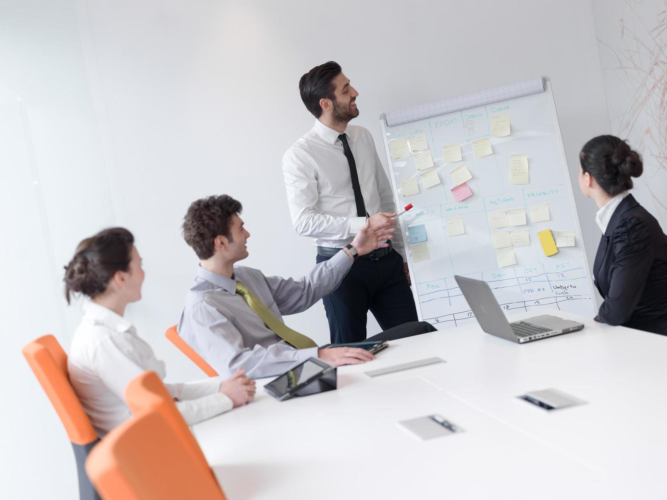 group of young business people  on meeting at modern startup office photo