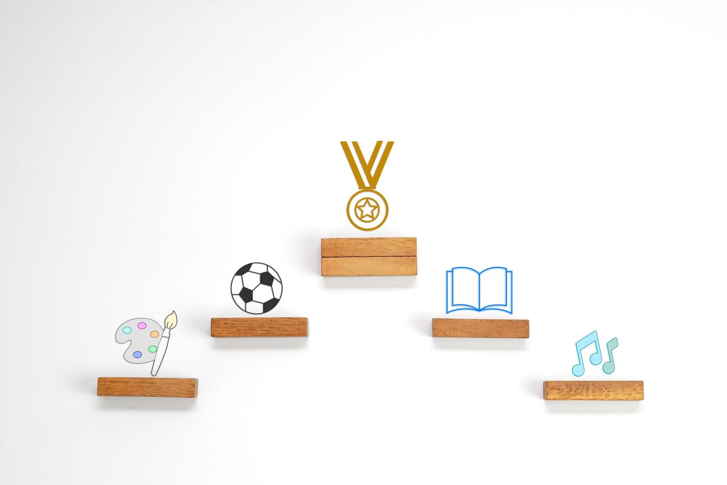 Wooden steps about school age activities on white background. Conceptual image of success, victory and development. photo