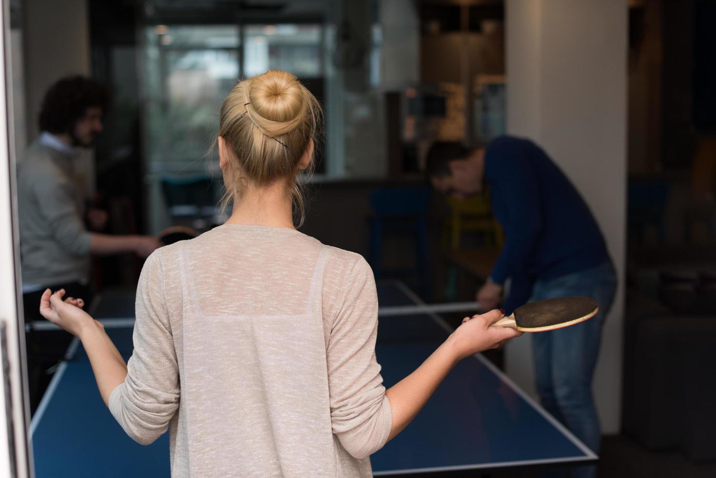 startup business team playing ping pong tennis photo