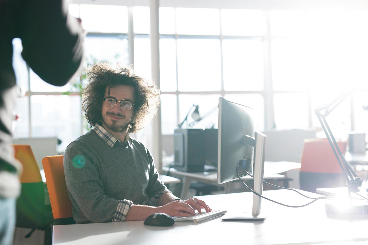 businessman working using a computer in startup office photo
