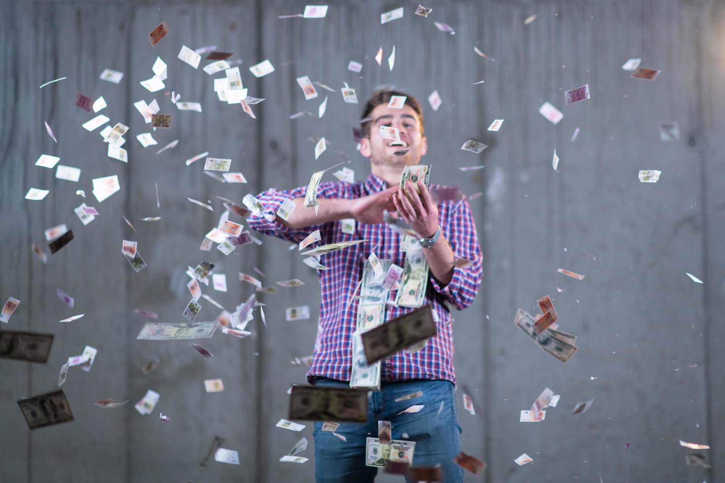 businessman making the rain of money photo