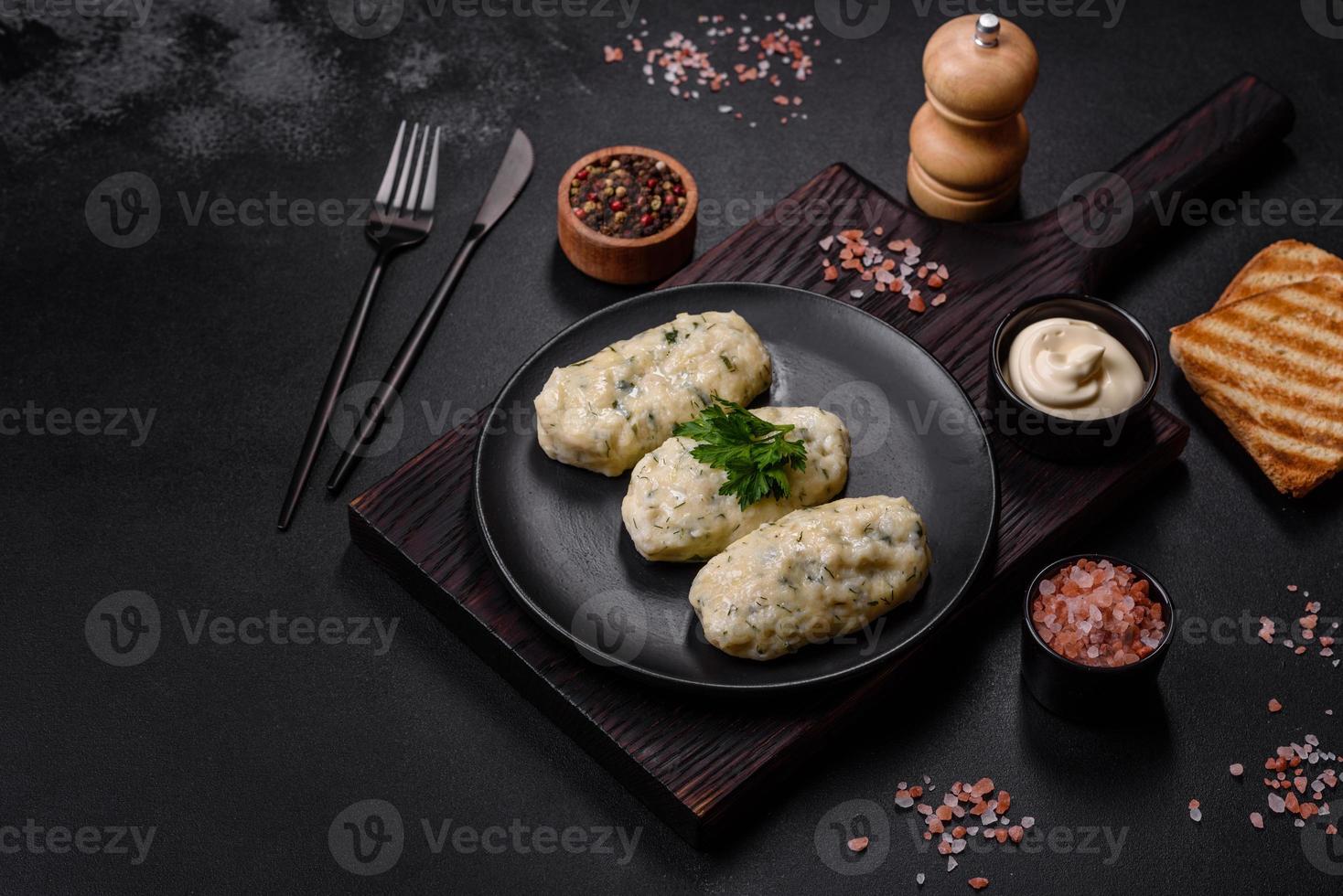 Traditional Lithuanian dish zeppelin, boiled potato dumplings stuffed with minced meat photo