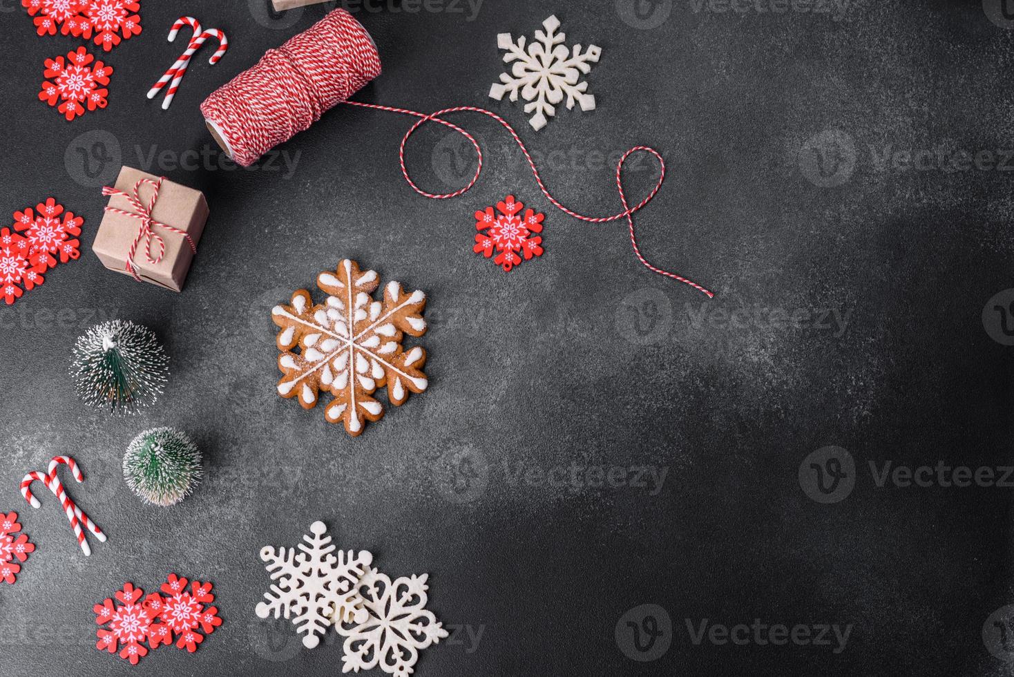 Christmas toys and decorations on a dark concrete background photo