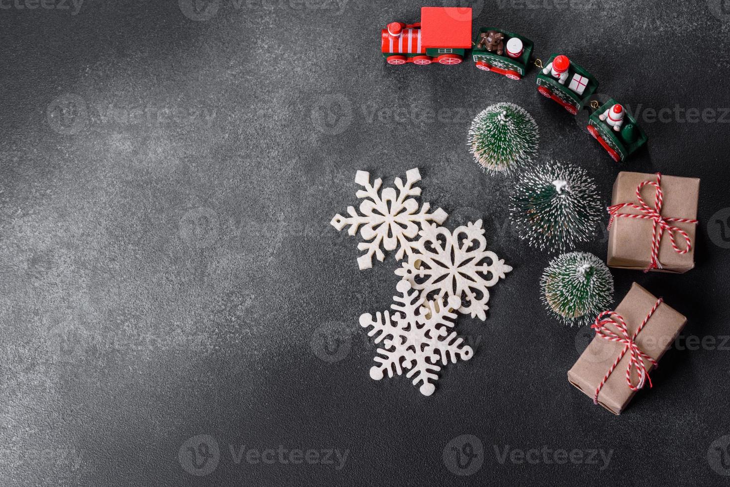 Christmas toys and decorations on a dark concrete background photo