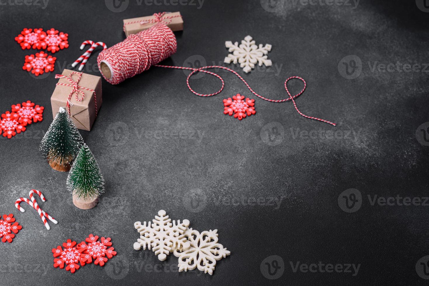 Christmas toys and decorations on a dark concrete background photo