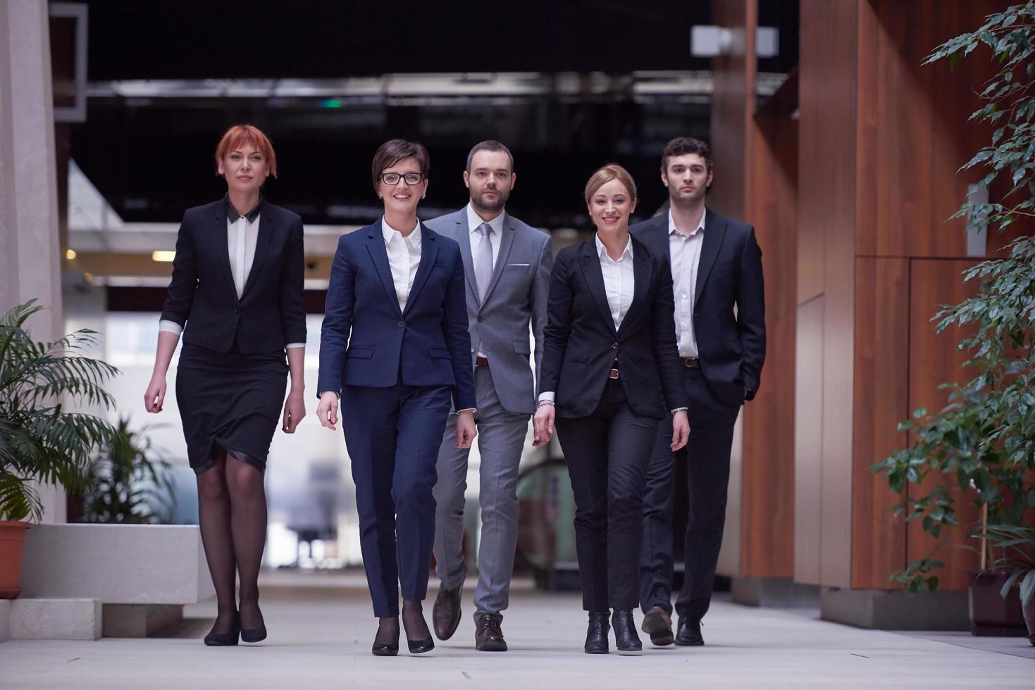 business people team walking photo