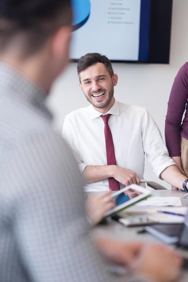 young business people group on meeting at modern office photo