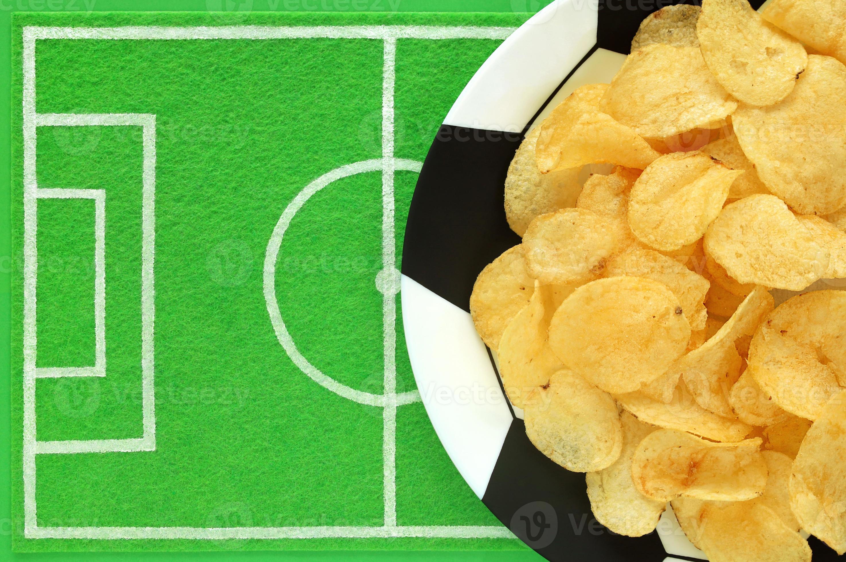 Football Soccer Party Table With Snacks Salted Potato Chips On Big football-soccer-party-table-with-snacks-salted-potato-chips-on-big