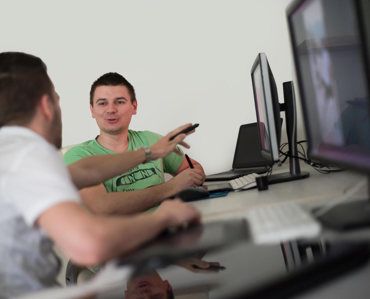 a group of graphic designers at work photo