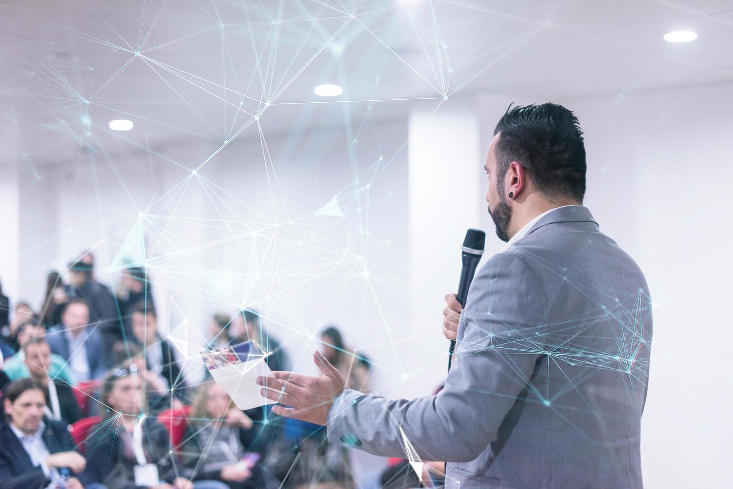 successful businessman giving presentations at conference room photo