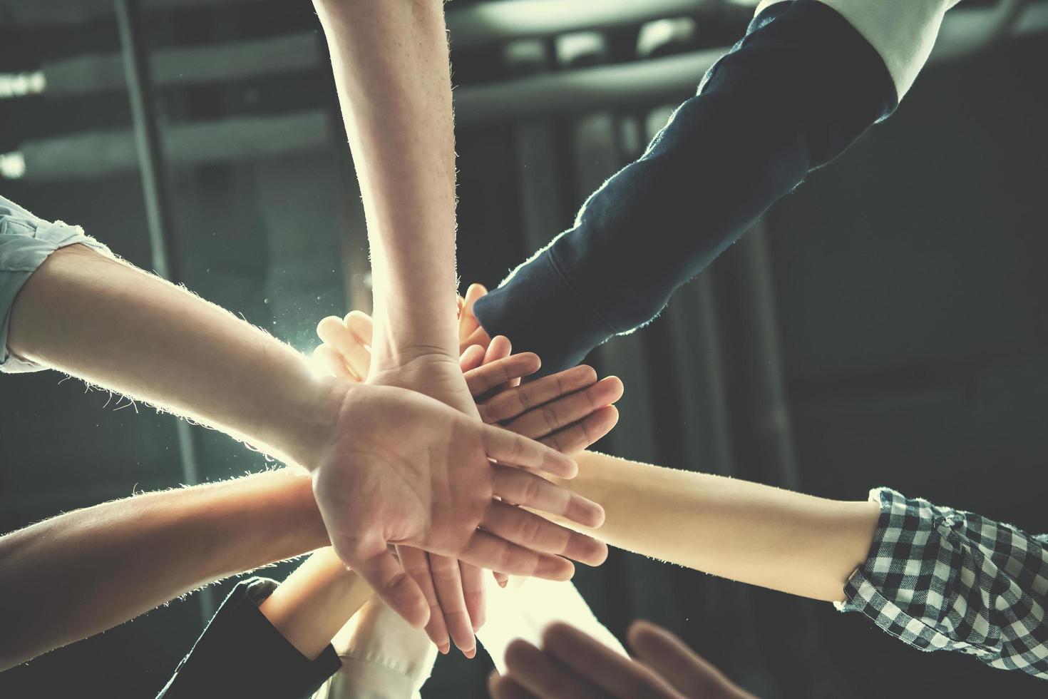 multiethnic Group of young business people celebrating success photo